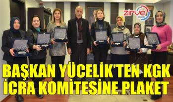 BAŞKAN YÜCELİK’TEN KGK İCRA KOMİTESİNE PLAKET