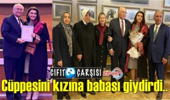 Cüppesini kızına babası giydirdi..